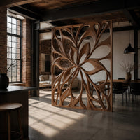 Room divider with a large open flower pattern of sweeping petals in an industrial loft open-plan living room with exposed brick