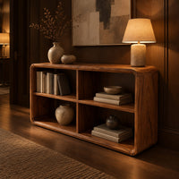 Open frame console table with four cubbies and soft edges in an evening entryway with walnut wall paneling