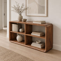 Open frame console table with four cubbies and soft edges in a Scandinavian entryway with white walls