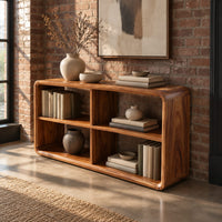 Open frame console table with four cubbies and soft edges in an industrial loft entryway with exposed brick