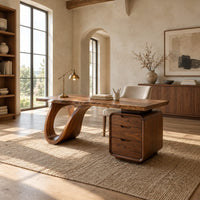 Desk with an open loop leg and a three drawer pedestal in a bright open plan home office