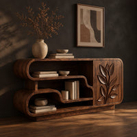 Sideboard with looping open shelves and a carved leaf door, three-quarter view showing the grain