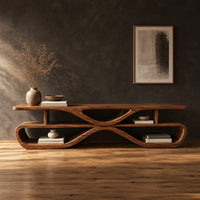 Low tv stand with open shelves in a pinched loop frame in a dark studio against a charcoal plaster wall