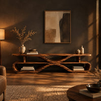 Low tv stand with open shelves in a pinched loop frame in a dark living room at golden hour