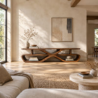 Low tv stand with open shelves in a pinched loop frame in a bright open plan living room