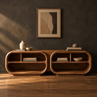 Open tv stand with two rounded capsule frames and shelves in a dark studio against a charcoal plaster wall