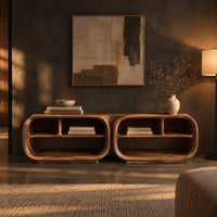 Open tv stand with two rounded capsule frames and shelves in a dark living room at golden hour