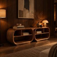 Open tv stand with two rounded capsule frames and shelves in an evening living room with walnut wall paneling