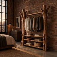 Open wardrobe with tree trunk posts, a hanging rail and three plank shelves in an industrial loft bedroom with exposed brick