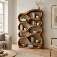 Open bookshelf with rounded pebble shaped compartments in a Scandinavian living room with white walls
