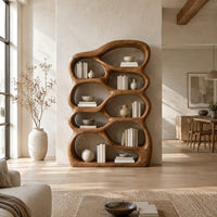 Open bookshelf with rounded pebble shaped compartments in a bright open plan living room