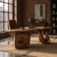 Desk with a flowing top, two drawer block and open loop leg in an industrial loft home office with exposed brick