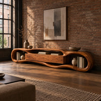 Organic loop shaped media stand with three center panels and open book nooks in an industrial loft living room with exposed brick
