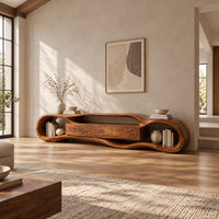 Organic loop shaped media stand with three center panels and open book nooks in a bright open plan living room