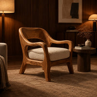 Open back chair with curved crest rail and splayed legs in an evening living room with walnut wall paneling