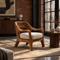 Open back chair with curved crest rail and splayed legs in an industrial loft living room with exposed brick