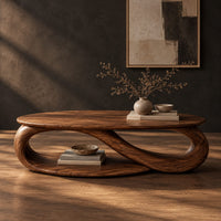 Oval coffee table with an infinity loop base and lower shelf, three-quarter view showing the grain