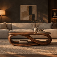 Oval coffee table with an infinity loop base and lower shelf in a dark living room at golden hour