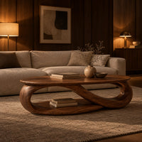 Oval coffee table with an infinity loop base and lower shelf in an evening living room with walnut wall paneling