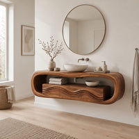 Oval loop bathroom vanity with a carved wave front in a Scandinavian bathroom with white walls