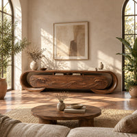 Oval loop frame tv stand with four wave carved fronts in a bright living room with arched windows and plants