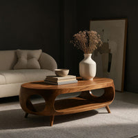 Oval porthole coffee table with a low shelf, three-quarter view showing the grain