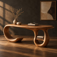 Oval top wooden desk with an open sweeping leg and a ring shaped base, three-quarter view showing the grain