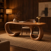 Oval top wooden desk with an open sweeping leg and a ring shaped base in an evening home office with walnut wall paneling