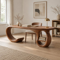 Oval top wooden desk with an open sweeping leg and a ring shaped base in a Scandinavian home office with white walls