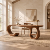 Oval top wooden desk with an open sweeping leg and a ring shaped base in a bright open plan home office