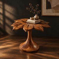 End table with a carved petal top on a flaring trumpet shaped pedestal, three-quarter view showing the grain