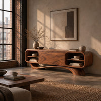 Low pill shaped media cabinet with open end shelves on a sweeping wave base in an industrial loft living room with exposed brick