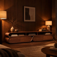 Pill shaped tv stand with three open top bays and two lower cabinets in an evening living room with walnut wall paneling