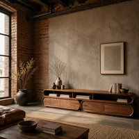 Pill shaped tv stand with three open top bays and two lower cabinets in an industrial loft living room with exposed brick