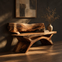 Bench with a live edge slab back, a flat slab seat and arched legs, three-quarter view showing the grain