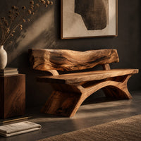 Corner detail of bench with a live edge slab back, a flat slab seat and arched legs beside wood, brass and linen samples