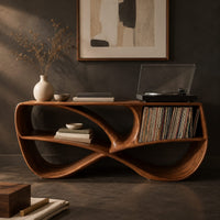 Corner detail of record console with a twisting figure eight frame and two open bays beside wood, brass and linen samples