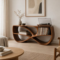 Record console with a twisting figure eight frame and two open bays in a Scandinavian living room with white walls