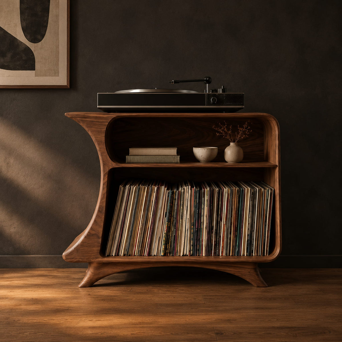 Flared record stand with a small upper bay and a larger open bay below in a dark studio against a charcoal plaster wall