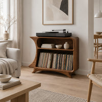 Flared record stand with a small upper bay and a larger open bay below in a Scandinavian living room with white walls