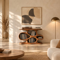 Sculpted record player stand with flowing open cutouts and a flat top in a bright open plan living room
