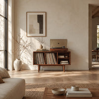Open record player stand with four bays on tapered legs in a bright open plan living room
