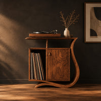 Record player stand with a ribbon base, a side slot and a raised top in a dark studio against a charcoal plaster wall