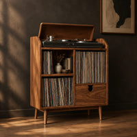 Wood record player stand on tapered legs with open cubbies and a drawer, three-quarter view showing the grain