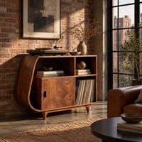 Record player stand with a teardrop shaped side, a wood door and tapered legs in an industrial loft living room with exposed brick