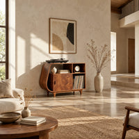 Record player stand with a teardrop shaped side, a wood door and tapered legs in a bright open plan living room