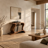Record player stand with wave shaped sides and a wide open shelf in a bright open plan living room