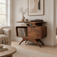 Record player stand with a winged top shelf, open bay and splayed legs in a Scandinavian living room with white walls