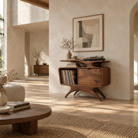 Record player stand with a winged top shelf, open bay and splayed legs in a bright open plan living room