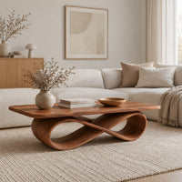 Rectangular wooden coffee table on a figure eight ribbon base in a Scandinavian living room with white walls